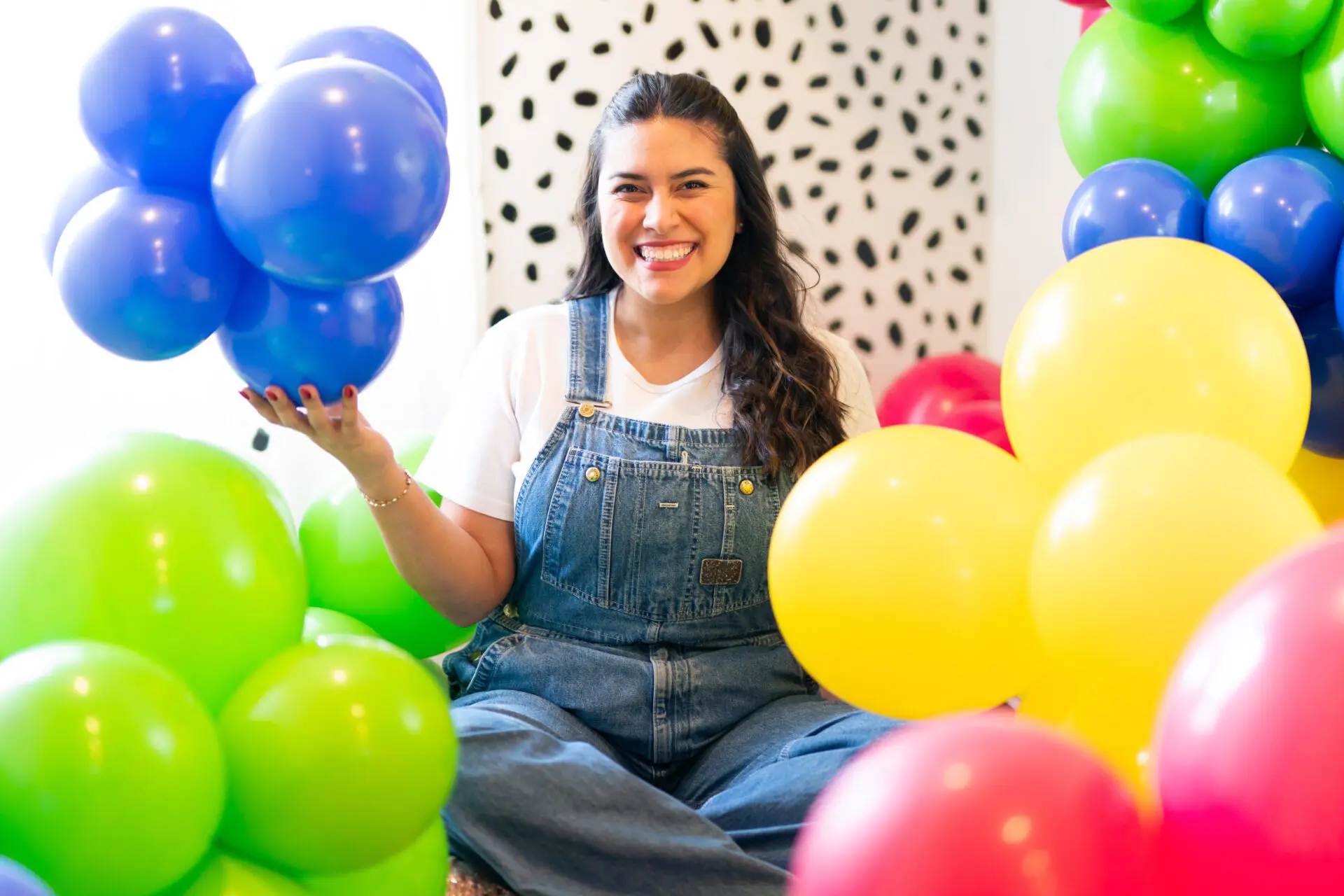 woman surrounded by balloons Kentucky 4-H Youth Advocacy Program